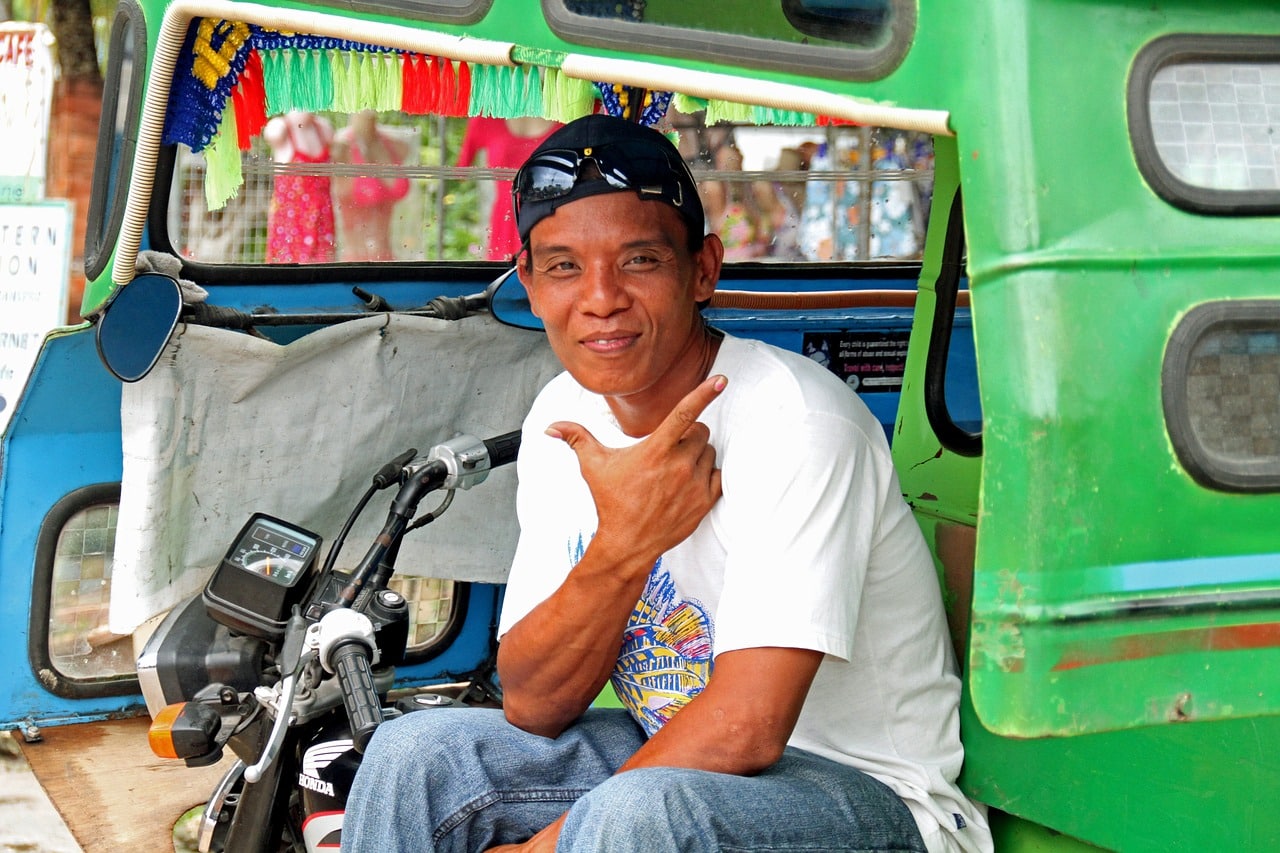 Een tricycle chauffeur | De Filipijnen