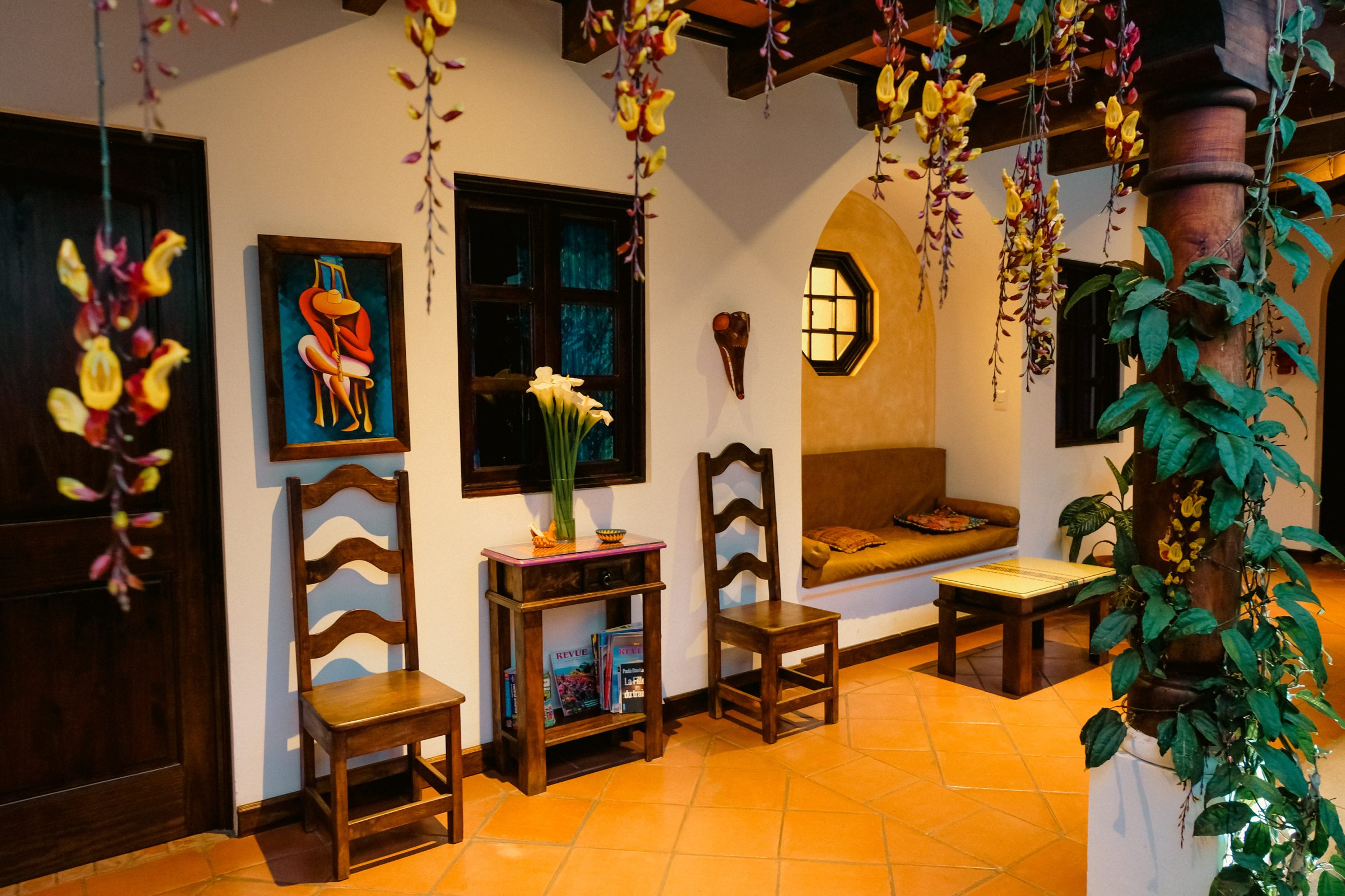 Elke kamer heeft ook een eigen buiten bankje in de tuin om in te relaxen | Casa Elena, Antigua