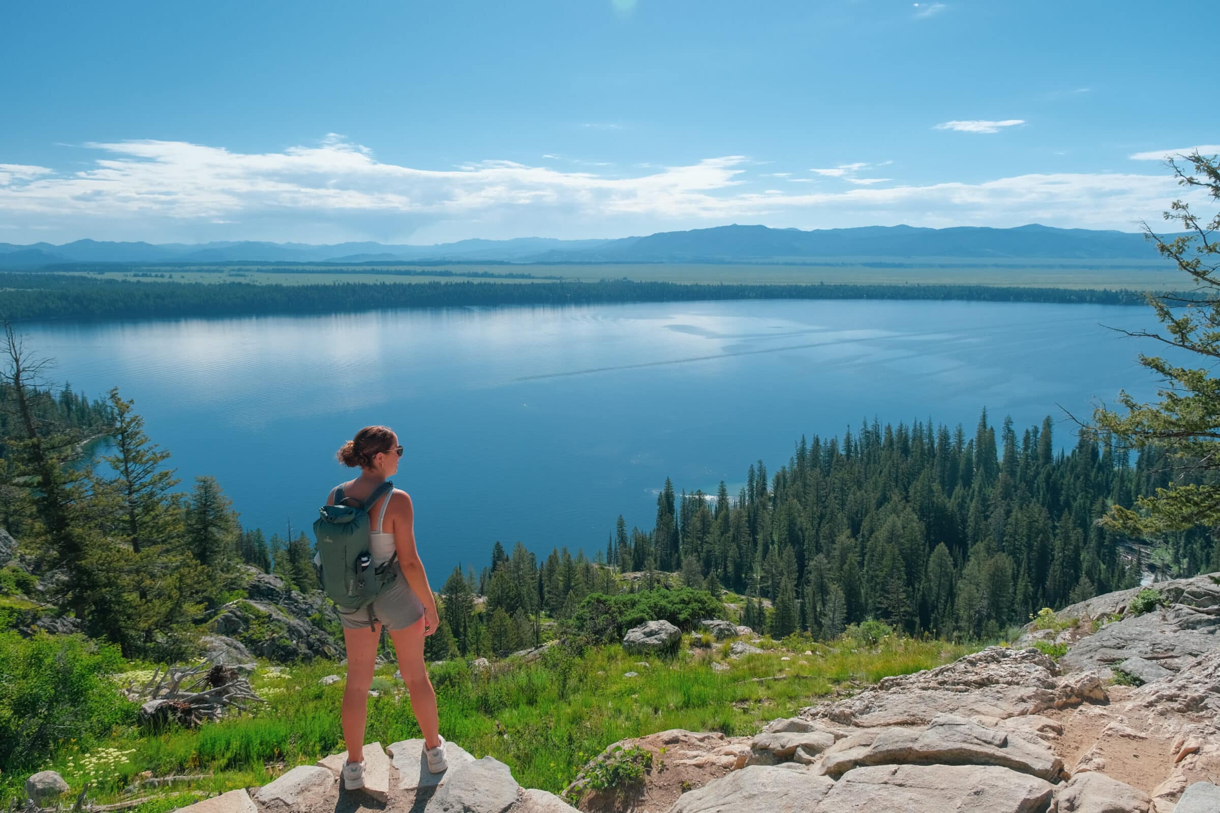 Malou at Inspiration Point viewpoint, looking at Jenny Lake